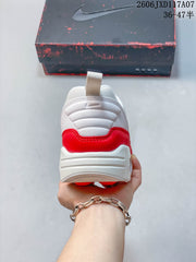 Nike Air Max 1 White and Red Sneakers