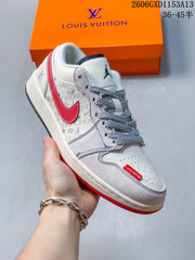Jordan 1 Low White and Red Patterned Sneakers