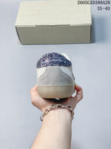 Golden Goose Super-Star Low-Top Sneakers in White and Gray