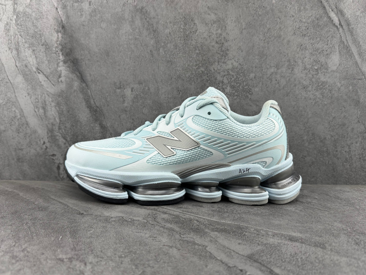 New Balance 1906R Sneakers in Pale Blue and Silver
