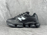 New Balance Black Sneakers with White Logo
