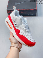 Nike Air Max 1 White and Red Sneakers