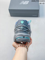 New Balance 1906R Sneakers in Gray and Black