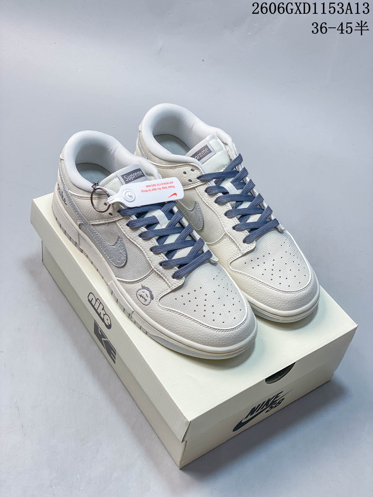 Nike Dunk Low Cream and Blue Low-Top Sneakers