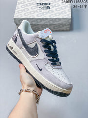 Nike Air Force 1 Low '07 x Supreme White and Navy Sneakers
