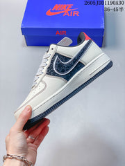 Nike Air Force 1 ’07 LV8 Low Sneakers, Ivory and Navy