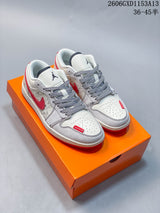 Jordan 1 Low White and Red Patterned Sneakers
