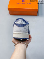 Air Jordan 1 Low Blue and White Patterned Sneakers