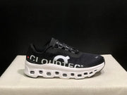 On Cloudmonster Black and White Running Sneakers