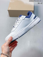 On White and Blue Low-Top Sneakers