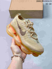 Nike Air Max Scorpion Flyknit Sneakers in Phantom Black Light Cream