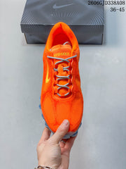 Nike Air Liquid Max Low-Top Running Shoes, Orange and Blue