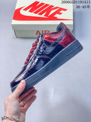 Nike Air Force 1 Low x Stüssy Black and Burgundy Sneakers