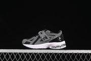 New Balance PV1906CJ Kids Sneakers, Black and Gray