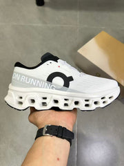 On Running White and Black Running Shoes