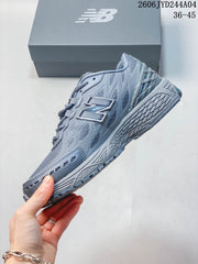 New Balance 1906R Sneakers in Gray and Black