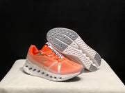 On Cloudsurfer Running Shoes in Coral and White
