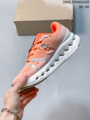 On Cloudsurfer Trail Running Shoes in Coral