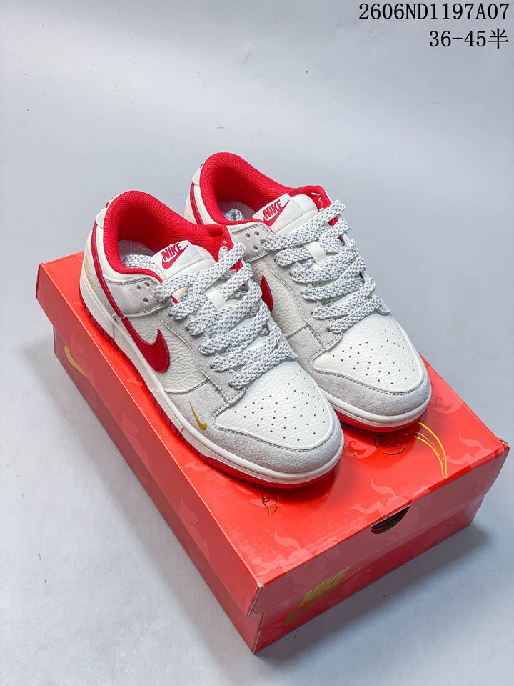 Nike SB Dunk Low Sneakers in White, Gray and Red