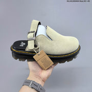 Dr. Martens Buckle-Strap Mule Clogs in Black and Sage