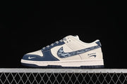 Nike SB Dunk Low Sneakers in Cream and Navy