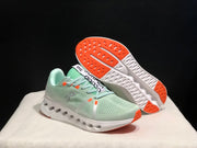 On Cloudsurfer Sneakers in Pale Green and White