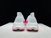 On Cloudboom Strike LS Running Shoes in Pink and White