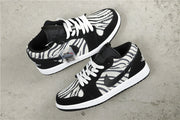Jordan Air Jordan 1 Mid Zebra Print Sneakers Black White