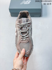 New Balance 204L Low-Top Sneakers in Gray and Brown