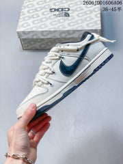 Nike SB Dunk Low x The North Face Sneakers, White and Navy