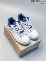 On White and Blue Low-Top Sneakers