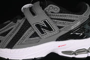 New Balance PV1906CJ Kids Sneakers, Black and Gray