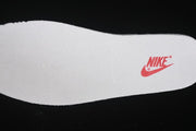 Nike SB Dunk Low Pro Supreme Sneakers in Cream and Red