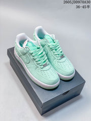 Nike Air Force 1 ’07 Low Sneakers in Pink or Mint