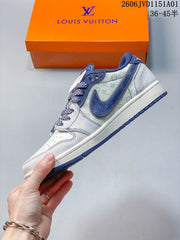 Air Jordan 1 Low Blue and White Patterned Sneakers