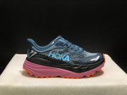 HOKA Stinson 7 Trail Running Shoes in Blue and Orange