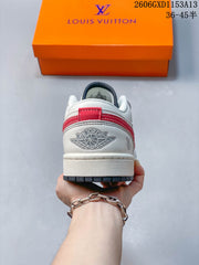 Jordan 1 Low White and Red Patterned Sneakers