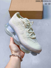 Nike Air Max Scorpion Flyknit Sneakers in Phantom Black Light Cream