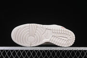 Nike SB Dunk Low Pro Supreme Sneakers in Cream and Red