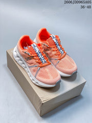 On Cloudsurfer Trail Running Shoes in Coral