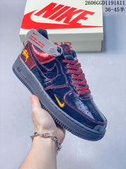 Nike Air Force 1 Low x Stüssy Black and Burgundy Sneakers