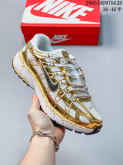 Nike Initiator Running Shoes in White and Gold